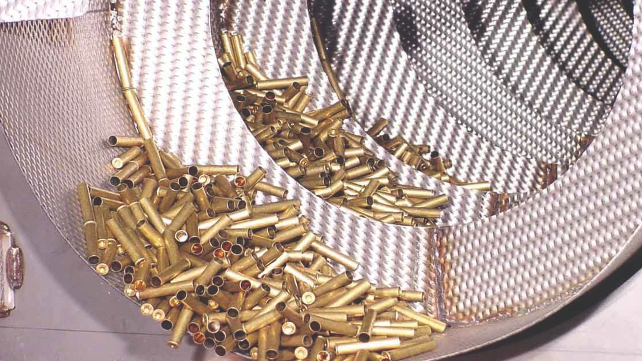 Brass bullet casings in a tumbler